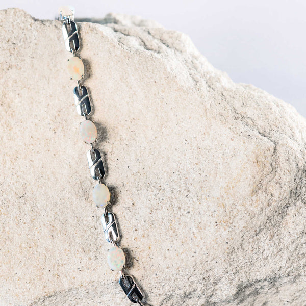 multi-coloured white opal silver bracelet in a double link design