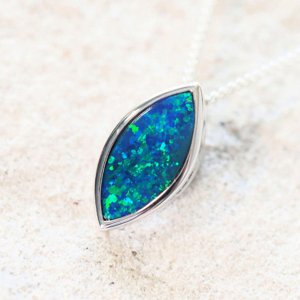 blue and green opal necklace pendant set in 18ct white gold