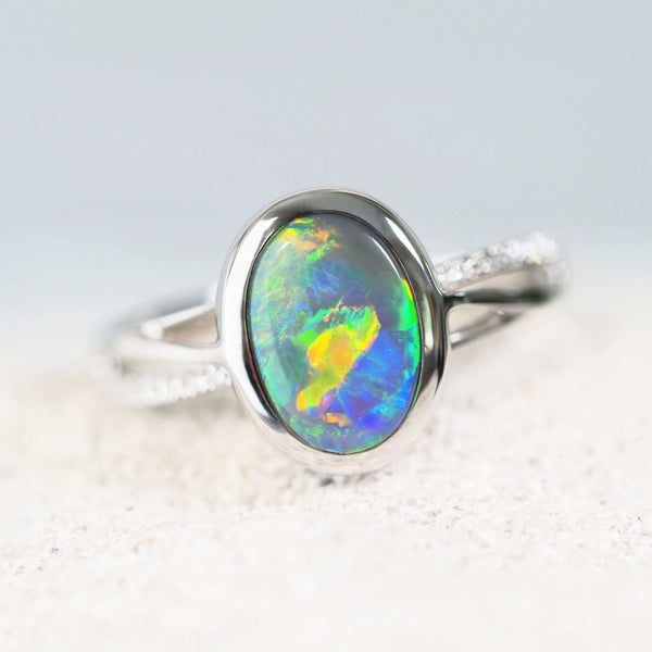 multi-colour lightning ridge black opal ring set in white gold with diamonds