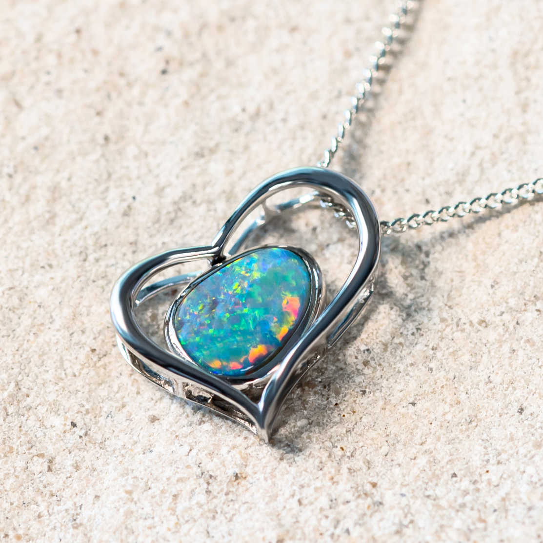 colourful australian doublet opal set in a silver necklace