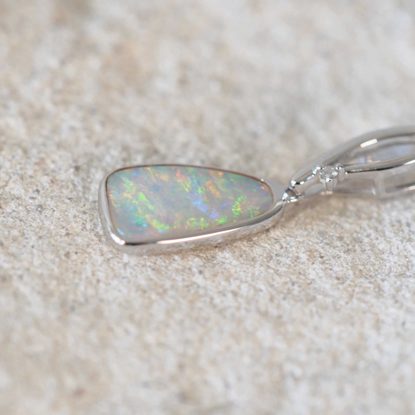 crystal opal white gold pendant