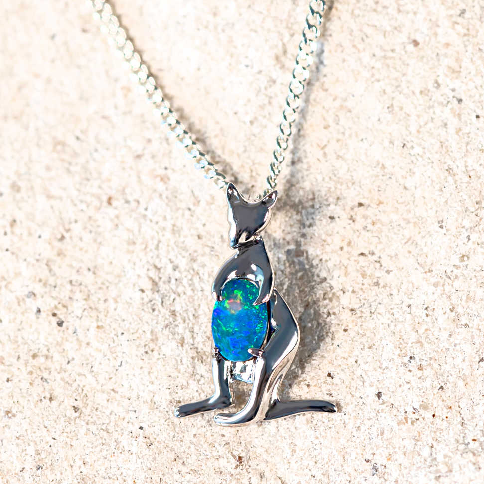 kangaroo design silver pendant set with a triplet opal