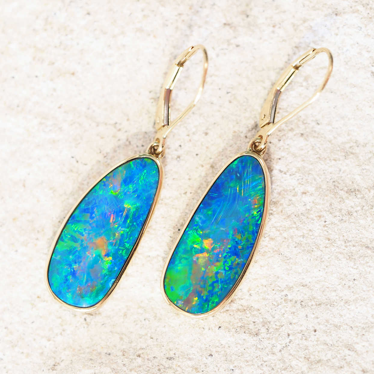 Colourful doublet opal earrings in gold