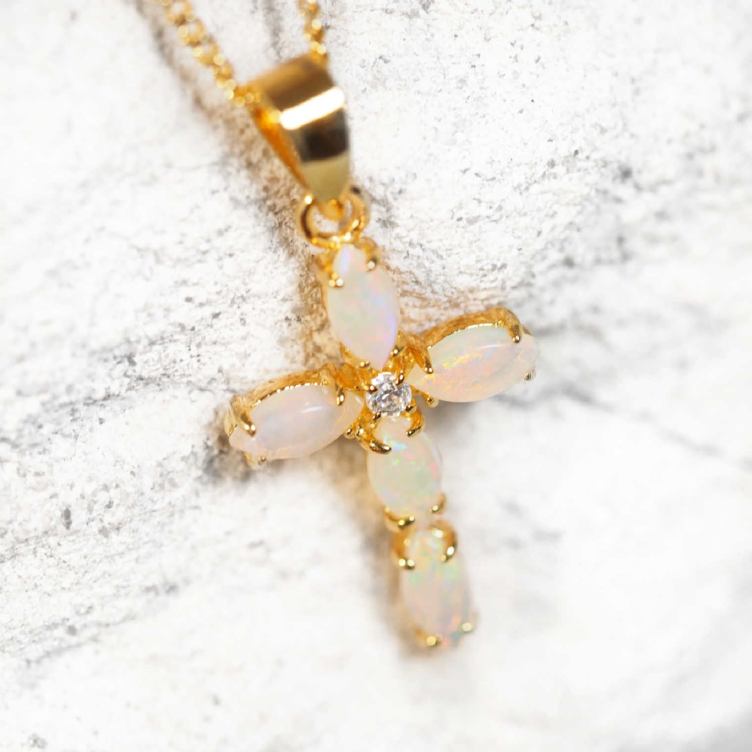 ‘Cross’ gold-plated sterling silver opal pendant with five marquise-shaped South Australian solid white opals and cubic zirconia accent