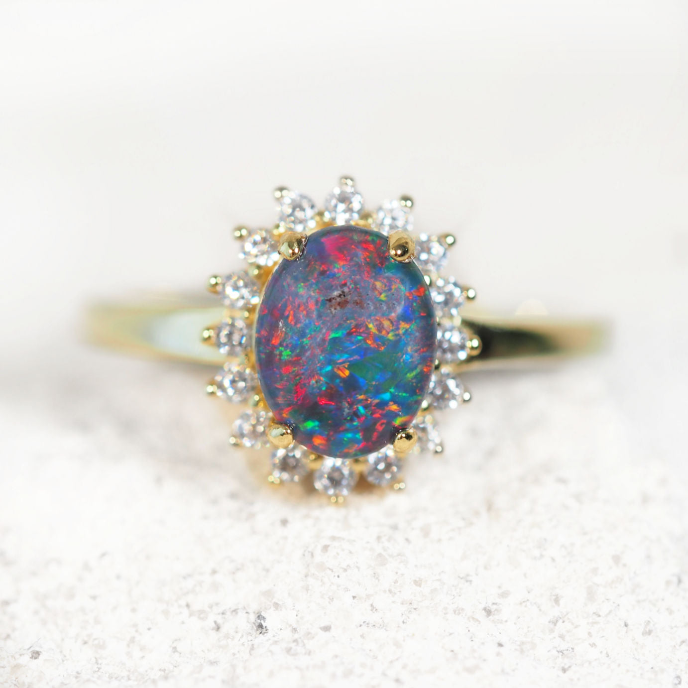 colourful opal ring set with diamantes in gold plated silver