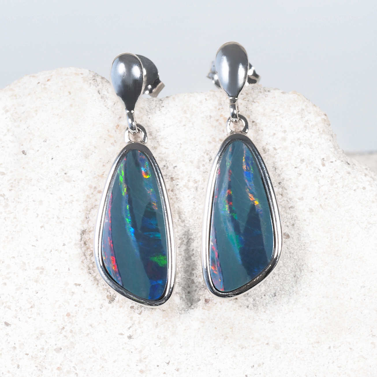 Stylish sterling silver drop opal earrings featuring vibrant, patterned Australian opals