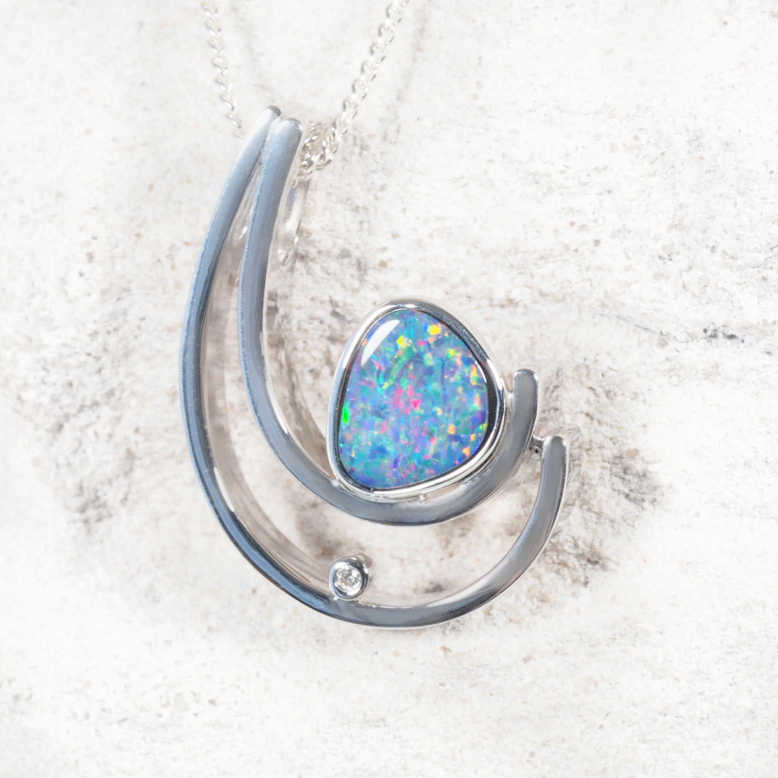 Sterling silver opal pendant with oval Australian doublet opal and crystal accent