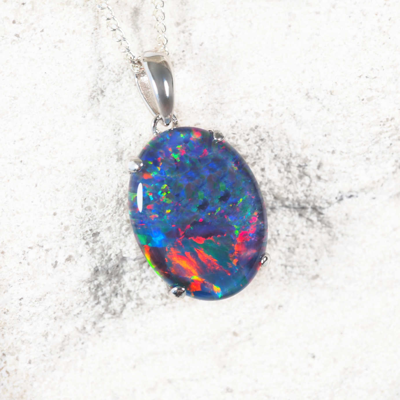 Elegant sterling silver opal necklace pendant featuring oval multi-coloured Australian triplet opal
