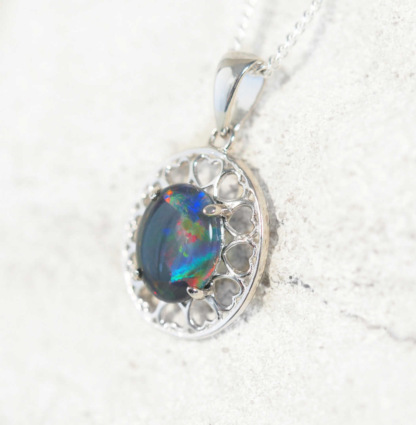 Sterling silver heart motif necklace pendant featuring oval Australian triplet opal with radiant multi-coloured flashes – Amore design with chain