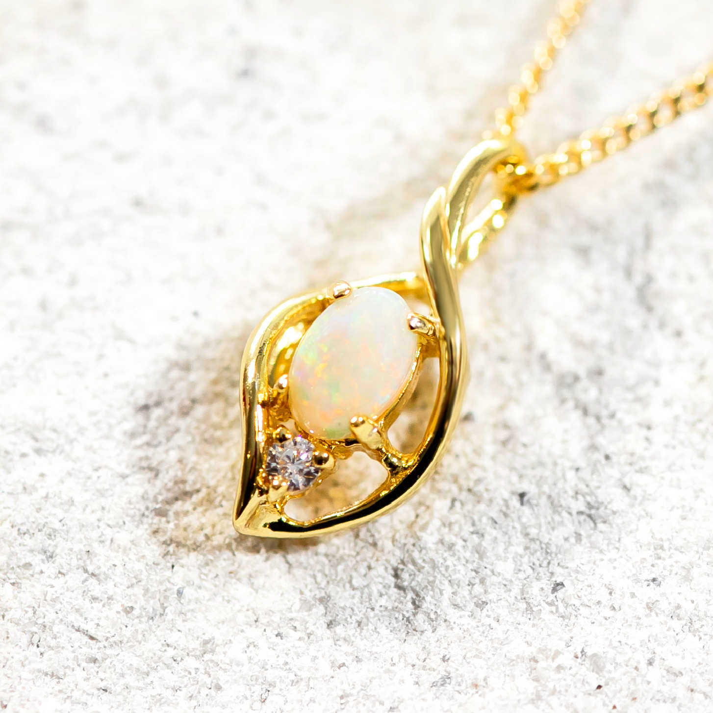 twist design opal necklace set in gold plated silver