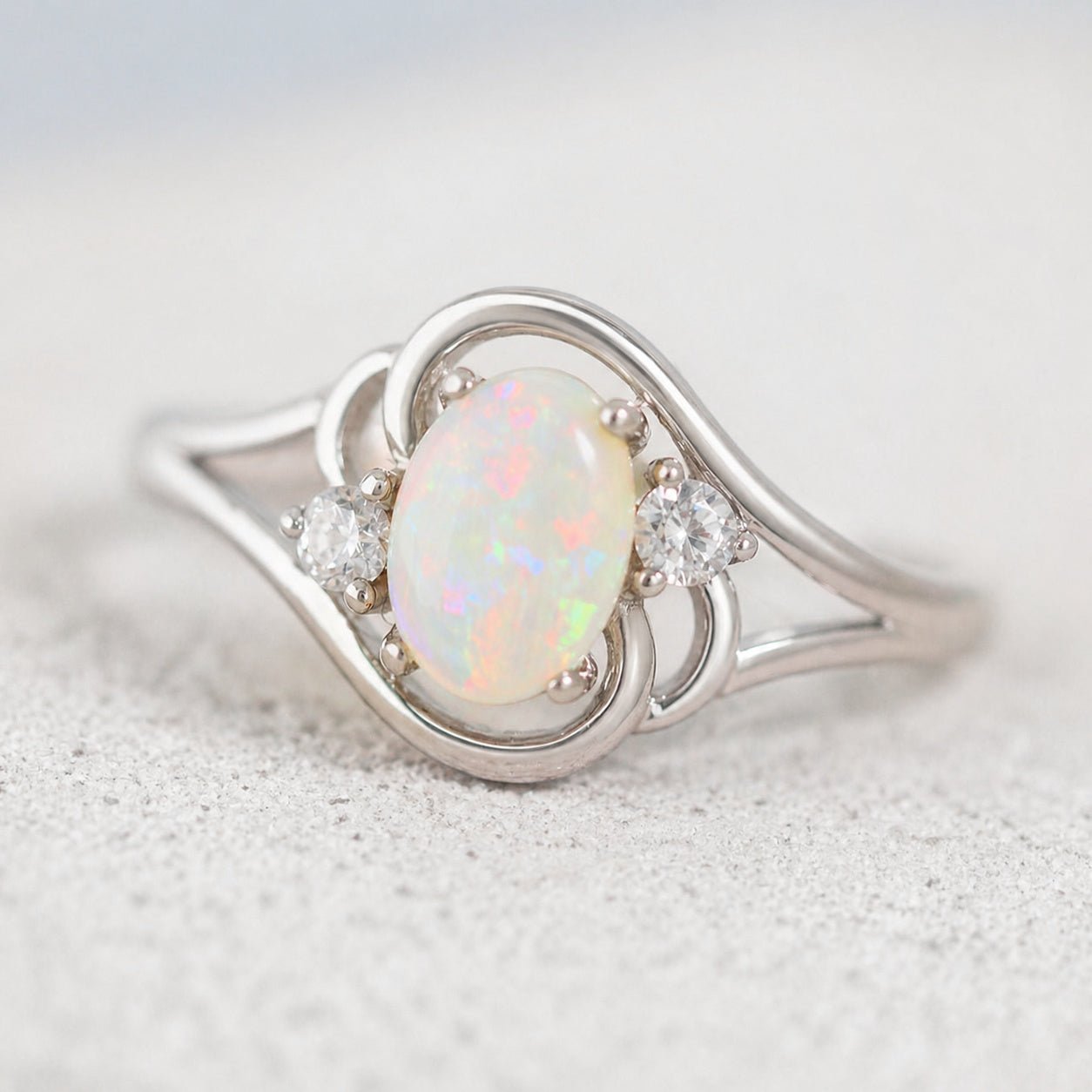 Australian white opal ring set in sterling silver with diamantes