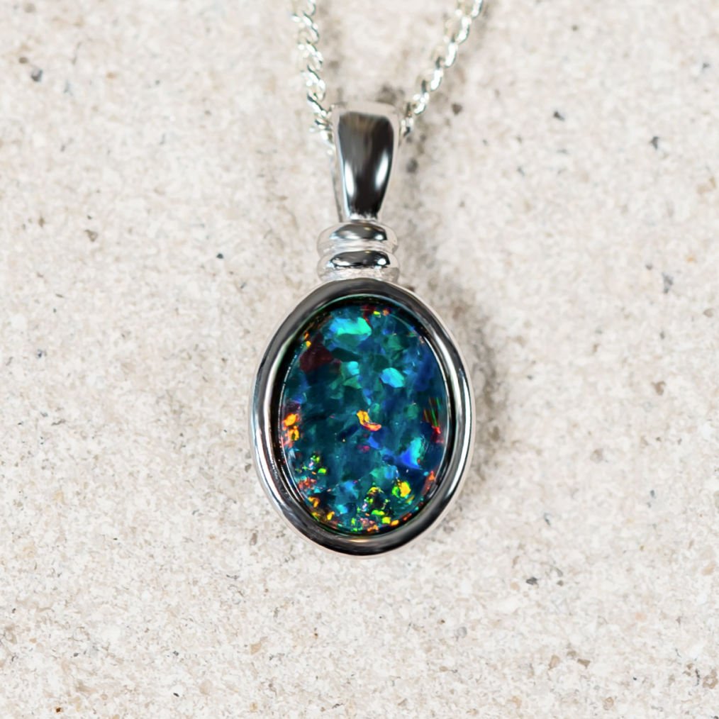 Sterling silver necklace pendant bezel set with a stunning and unique multi-coloured Australian triplet opal.