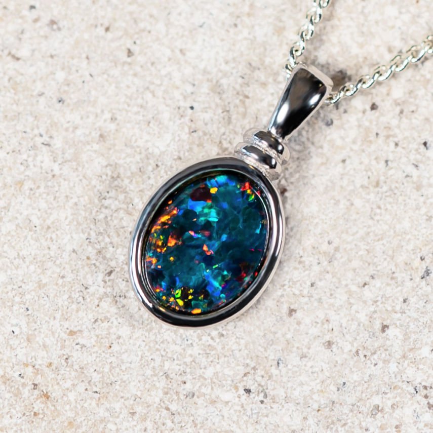 Sterling silver necklace pendant bezel set with a stunning and unique multi-coloured Australian triplet opal.