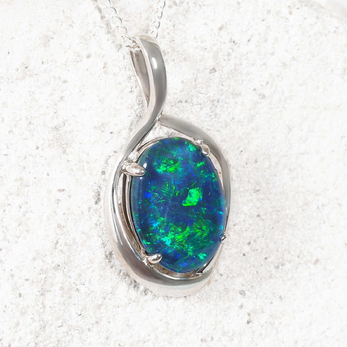 Oversized blue-green opal necklace in polished silver