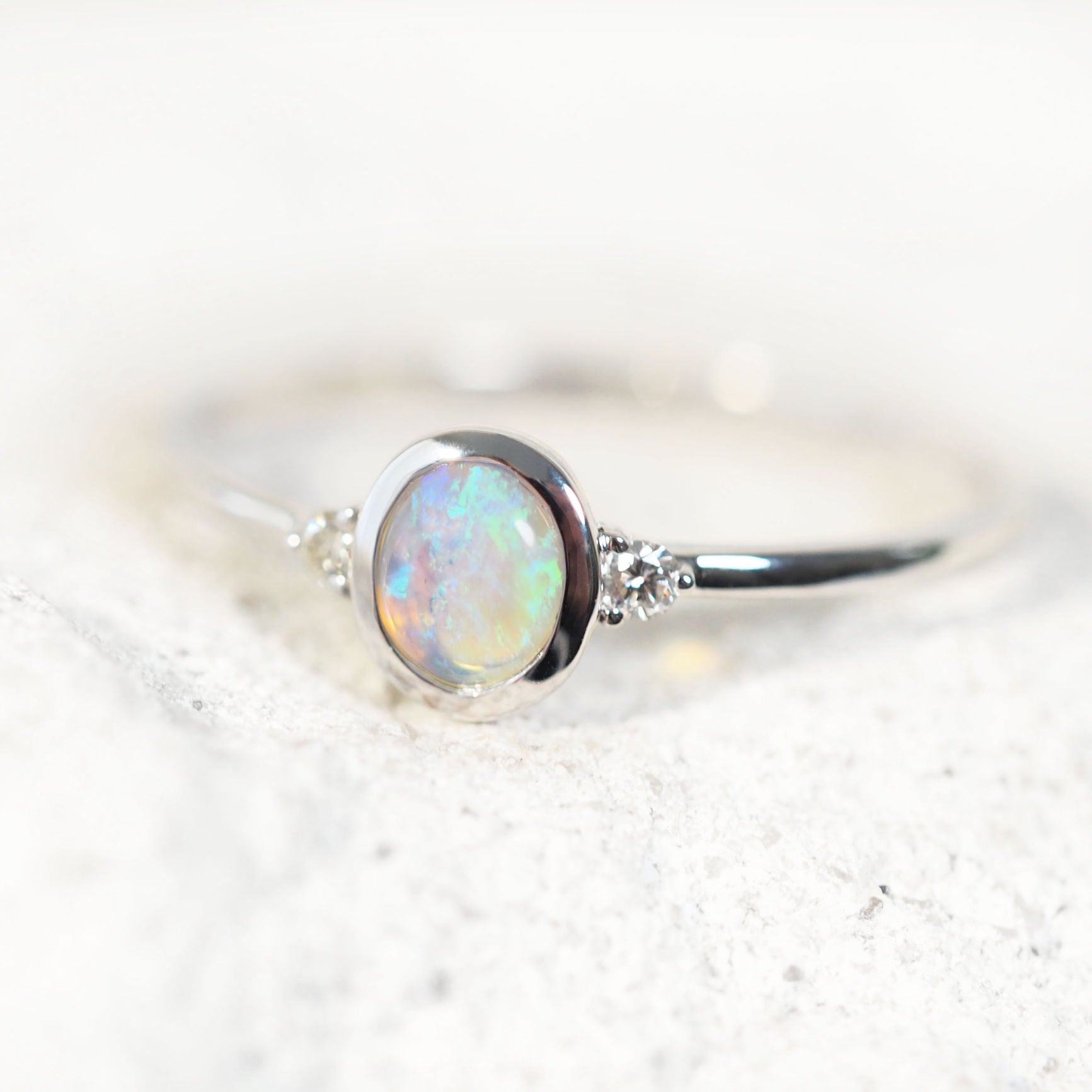green and blue oval-crystal opal ring
