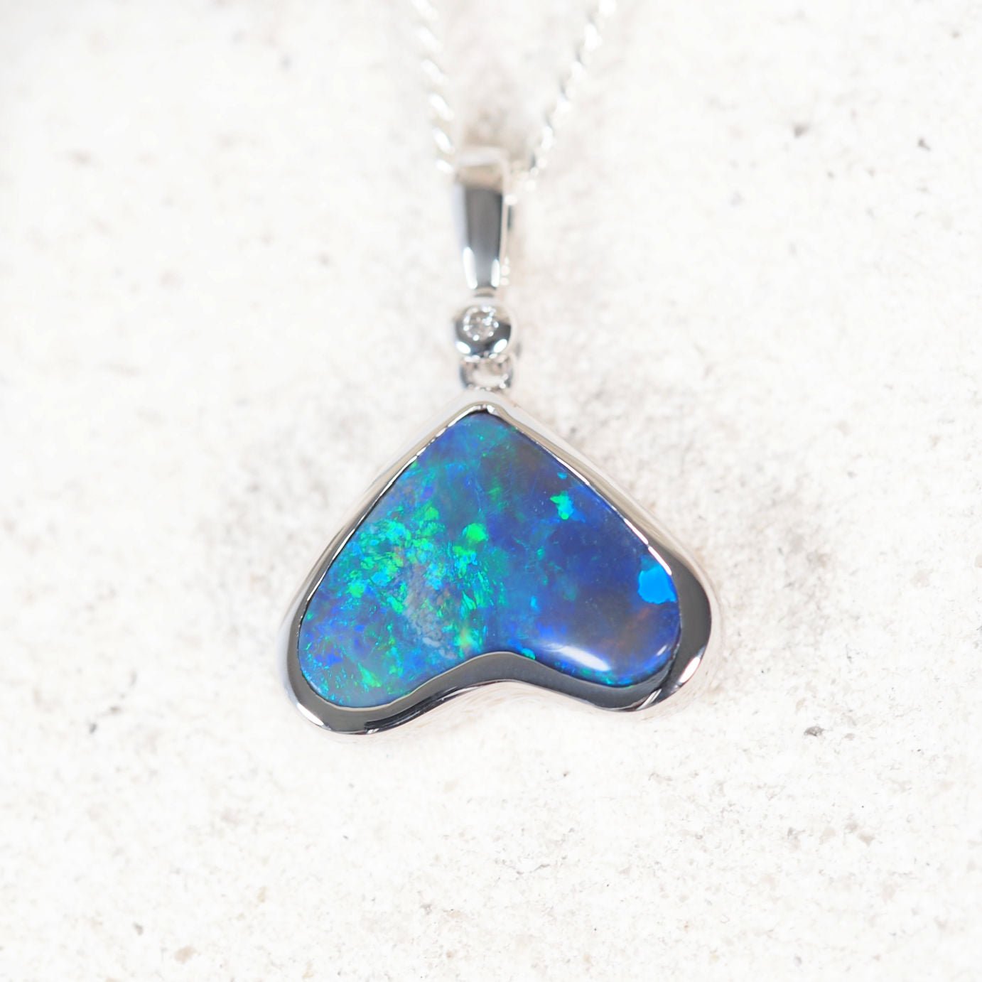 ‘Amora’ 18ct white gold black opal pendant – heart-shaped Lightning Ridge opal