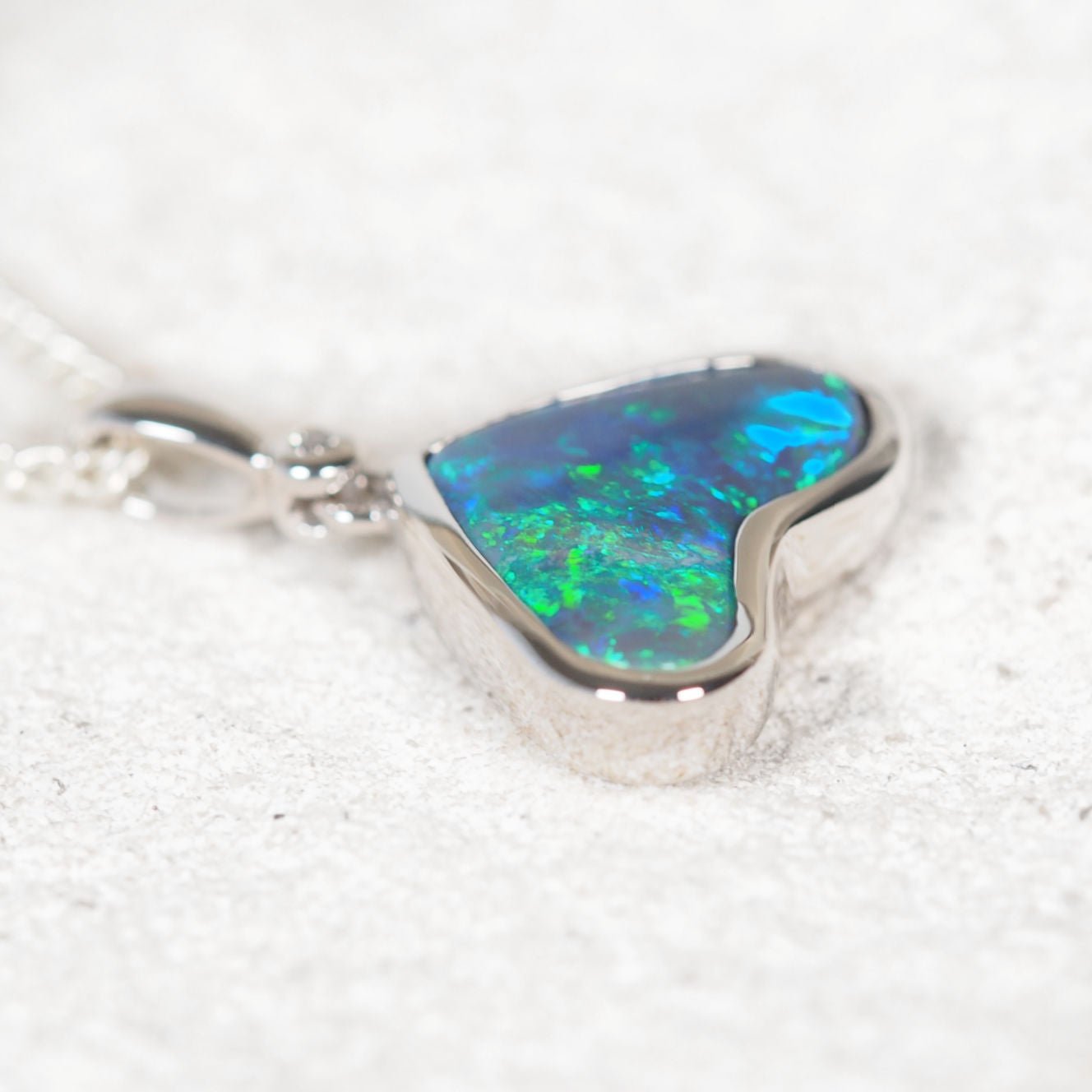 Luxury black opal and diamond handcrafted 18ct white gold pendant
