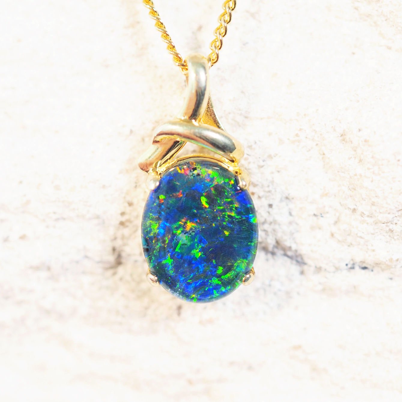 colourful oval opal pendant