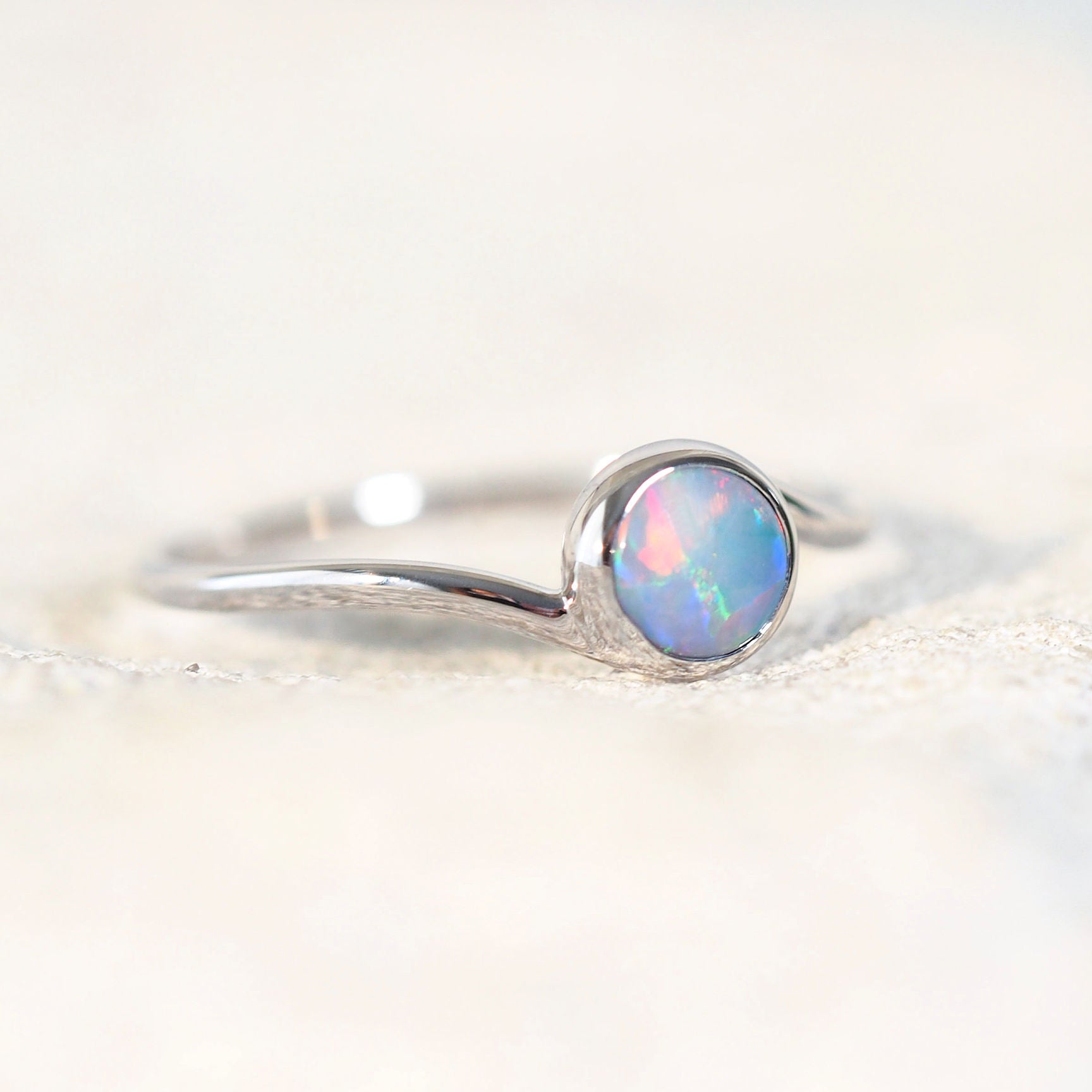 multi-colour opal ring in white gold