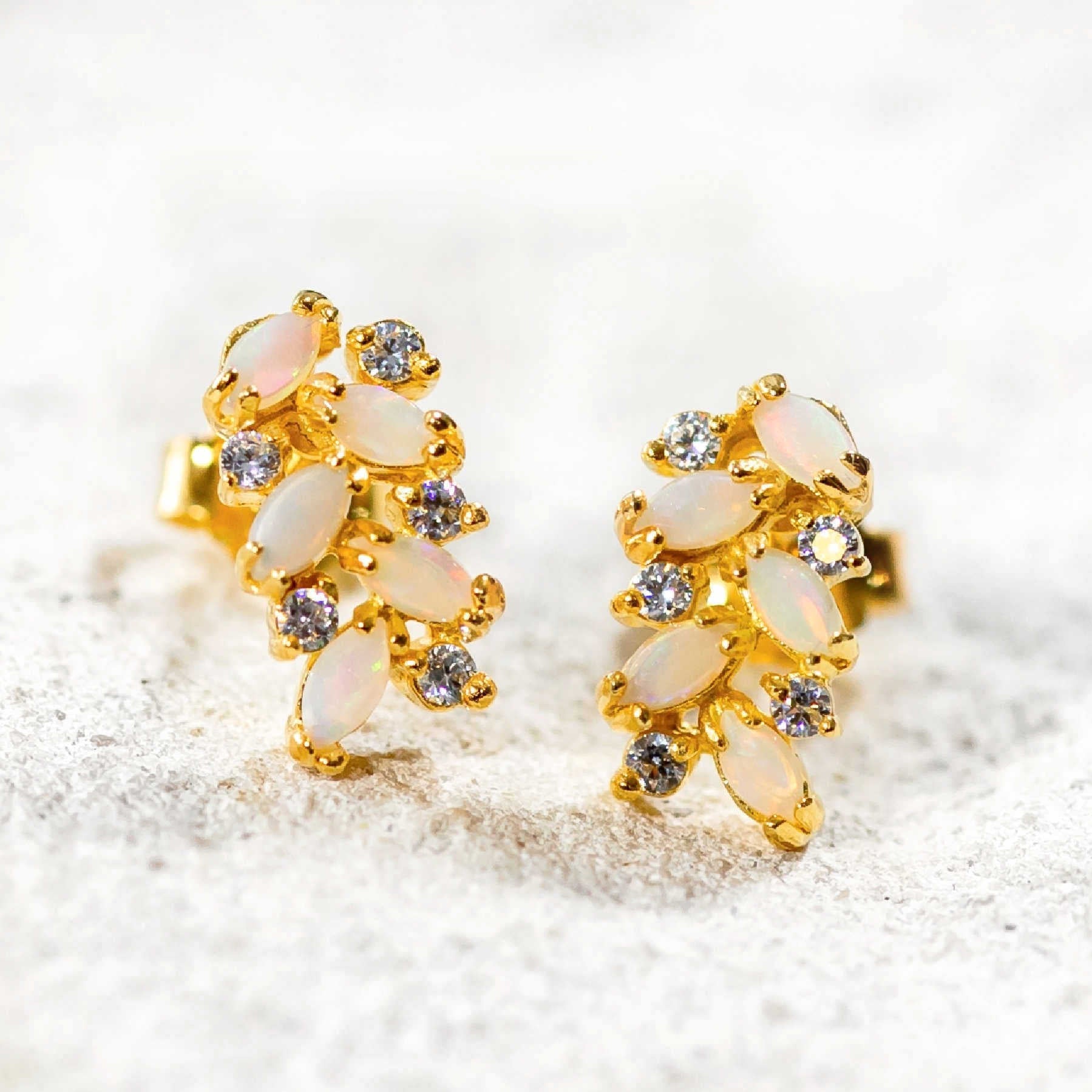 ornate crystal opal earrings set in gold plated silver with diamantes