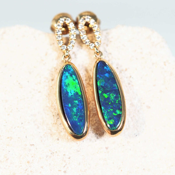 australian opal earrings set in 14ct gold with 24 sparkling diamonds
