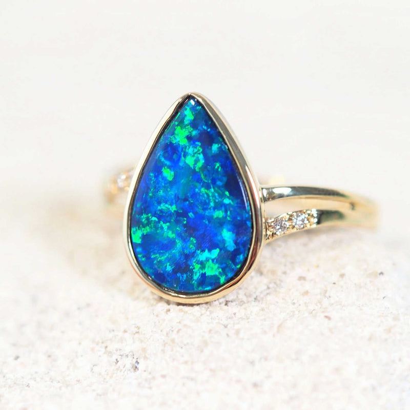 gold doublet opal ring with four diamonds