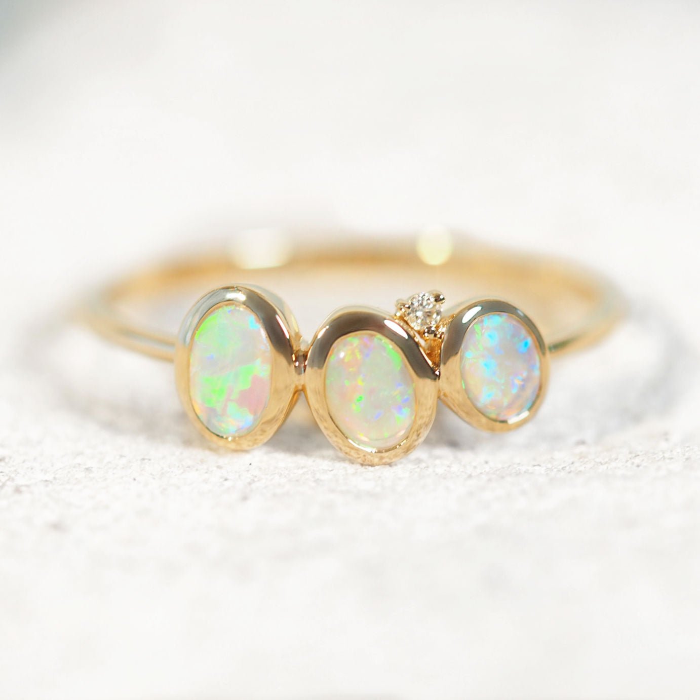Asha’ 14ct yellow gold opal ring – three Lightning Ridge crystal opals with diamond accent