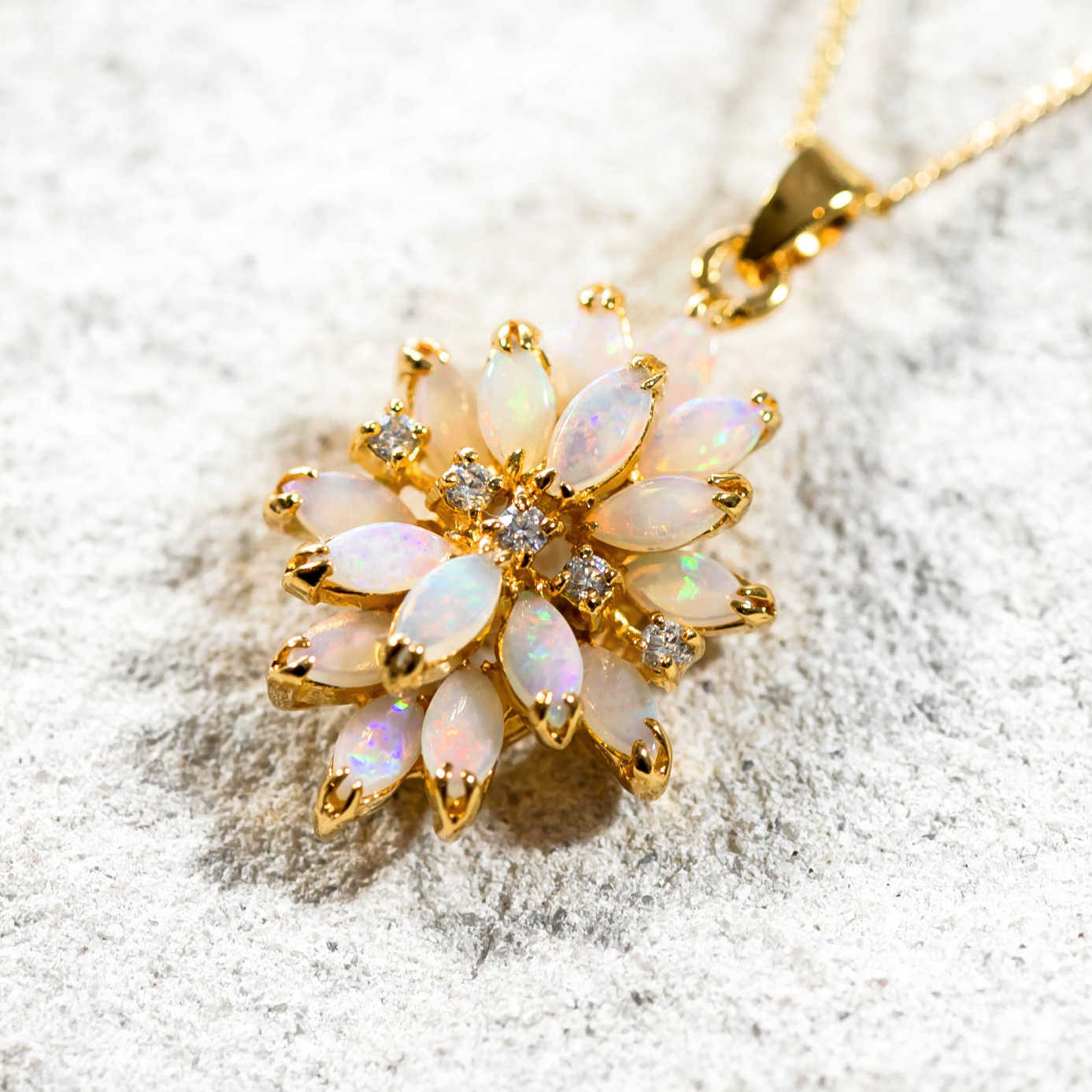 ornate opal pendant set in gold plated silver