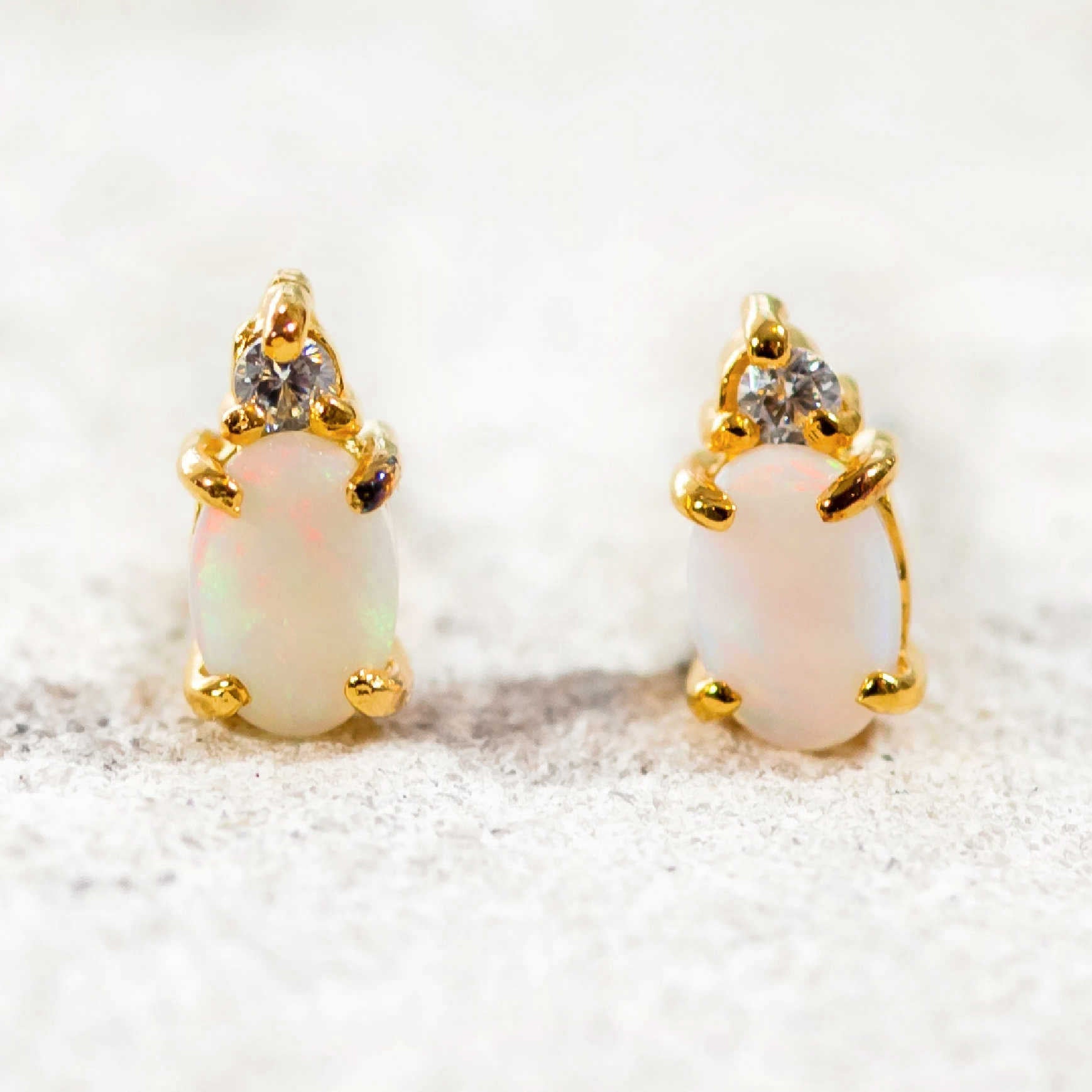 white opal earrings with diamantes