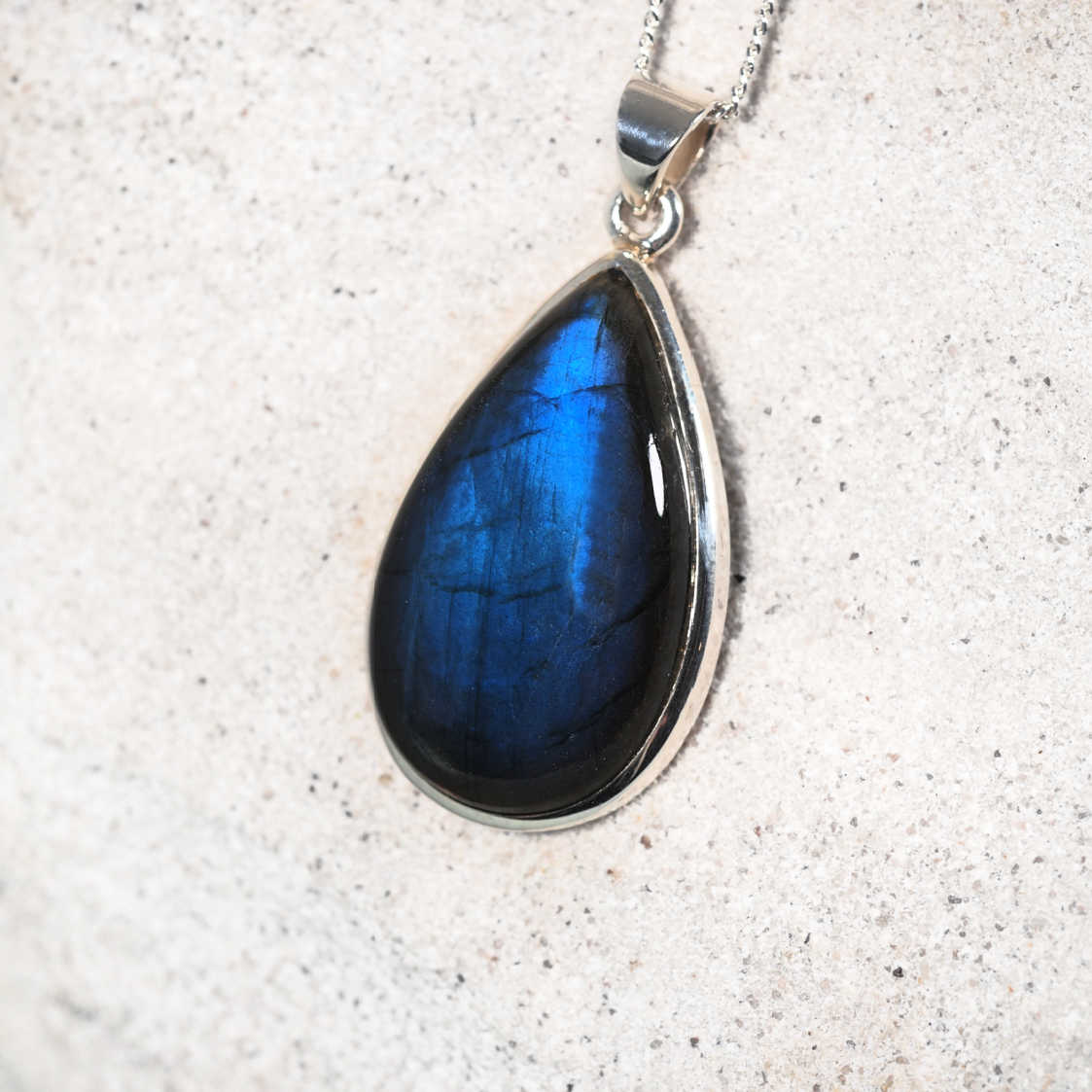 displaying a Labradorite gemstone with flashes of blue 