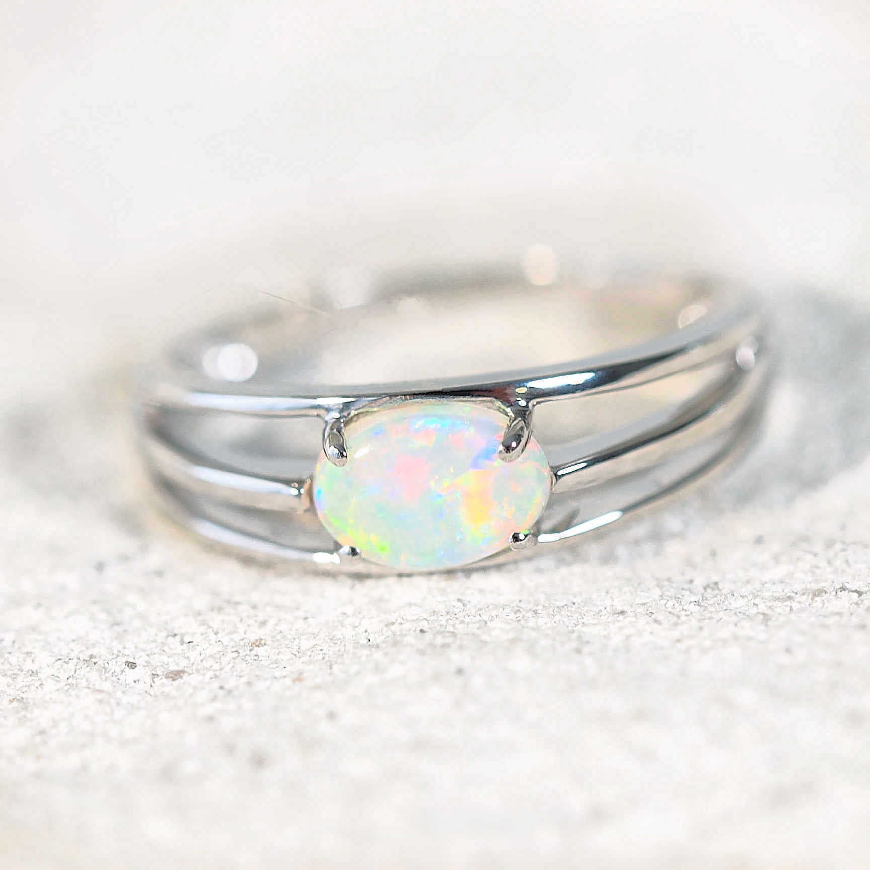 colourful crystal opal ring set in 14ct white gold