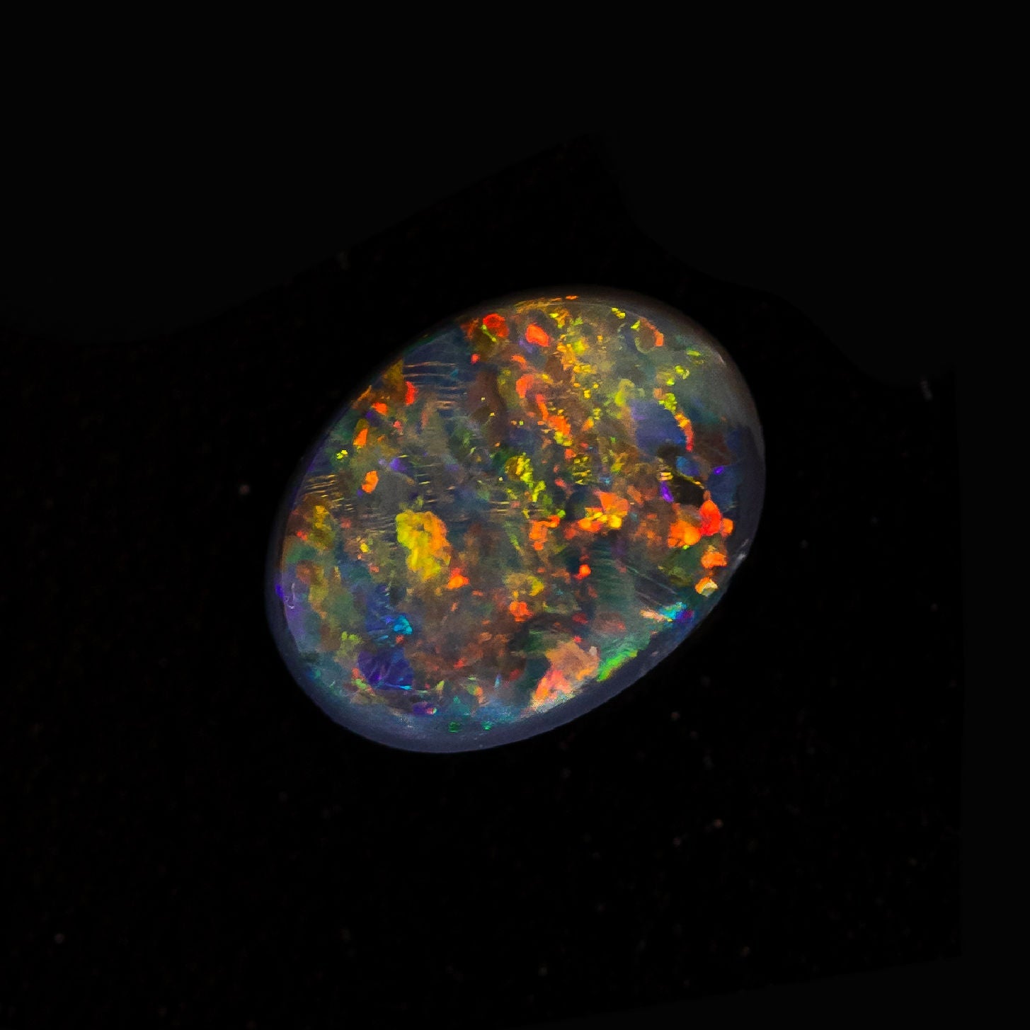 Floral-patterned black opal ideal for custom jewellery design
