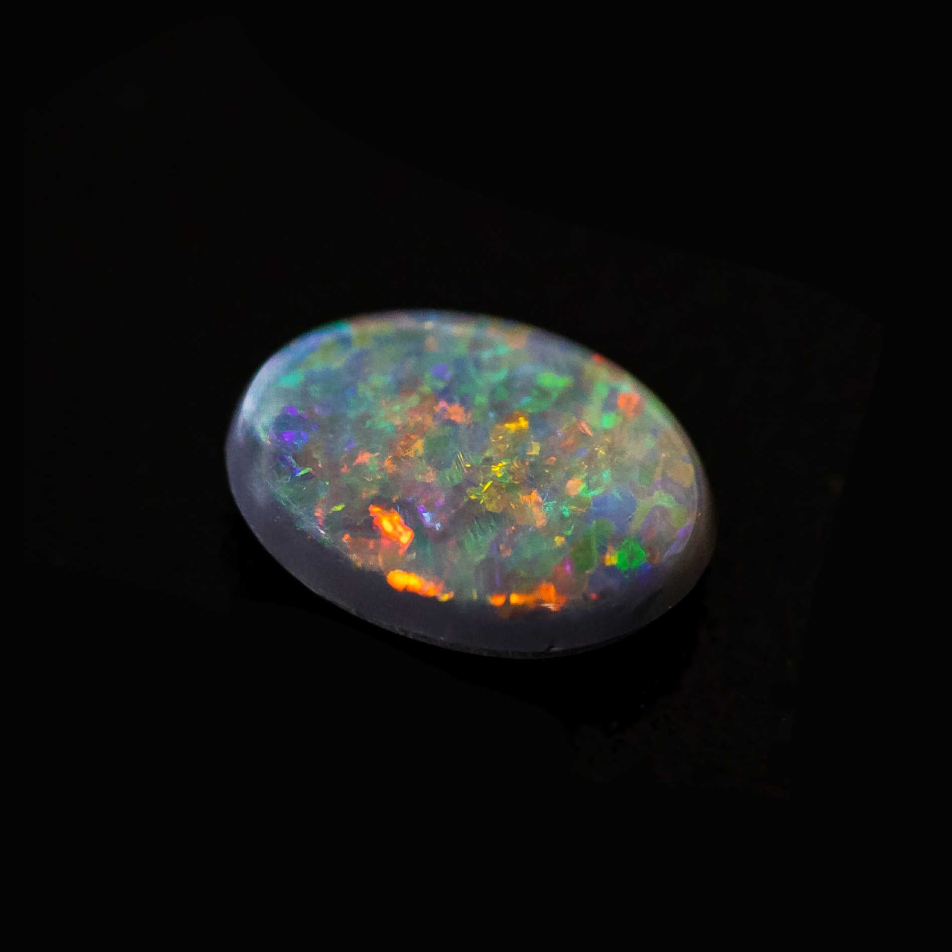 Ethically sourced Lightning Ridge opal with striking floral-patterned fire