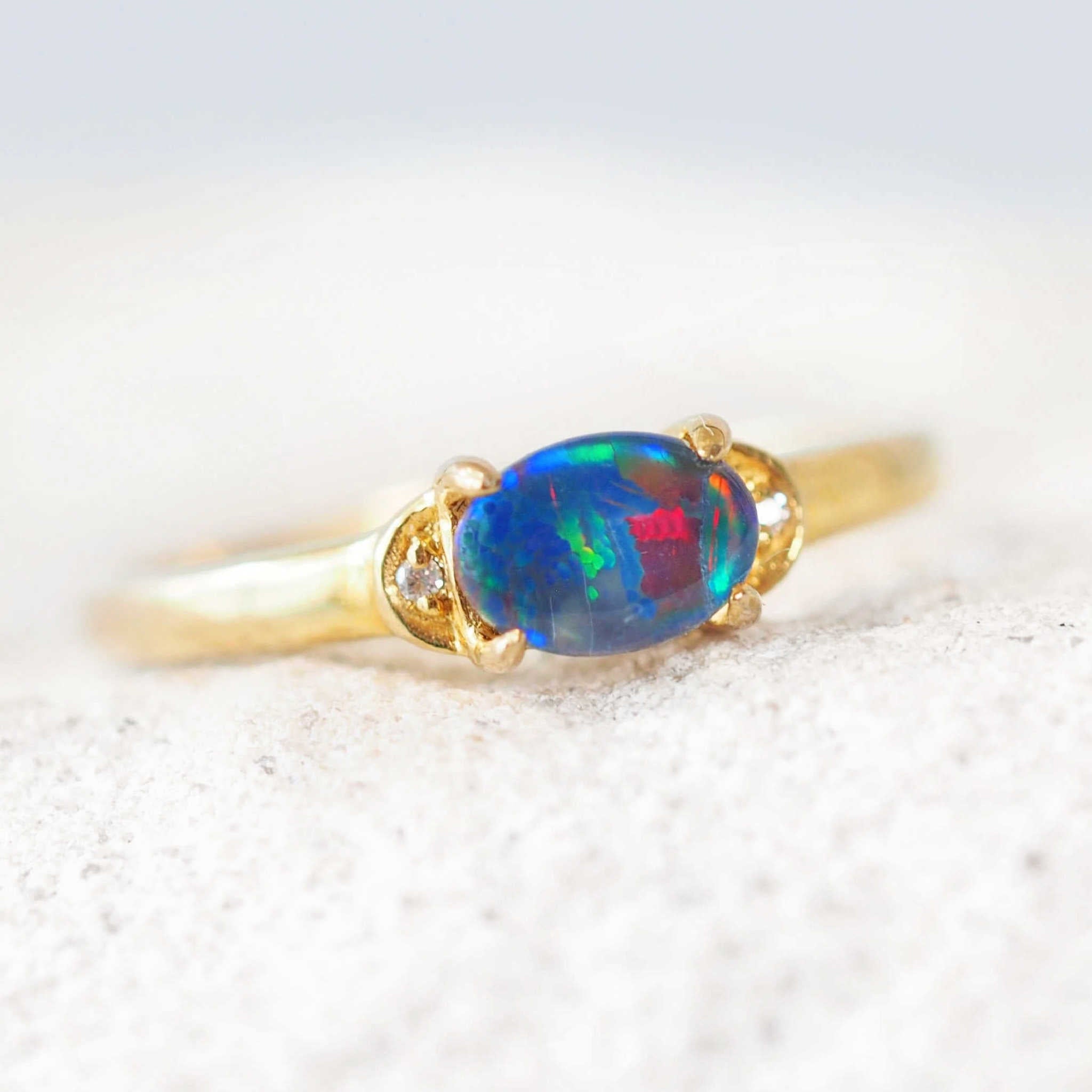 colourful triplet opal ring set in gold plated silver