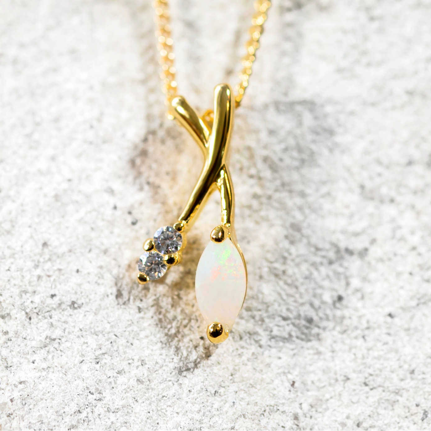 colourful white opal pendant set with a marquise shaped australian natural opal