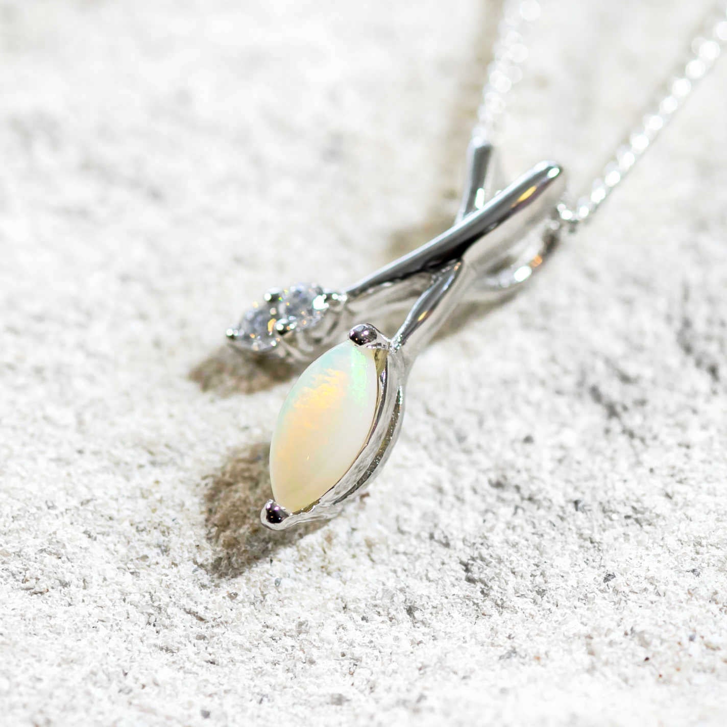 opal pendant in silver set with a marquise opal 