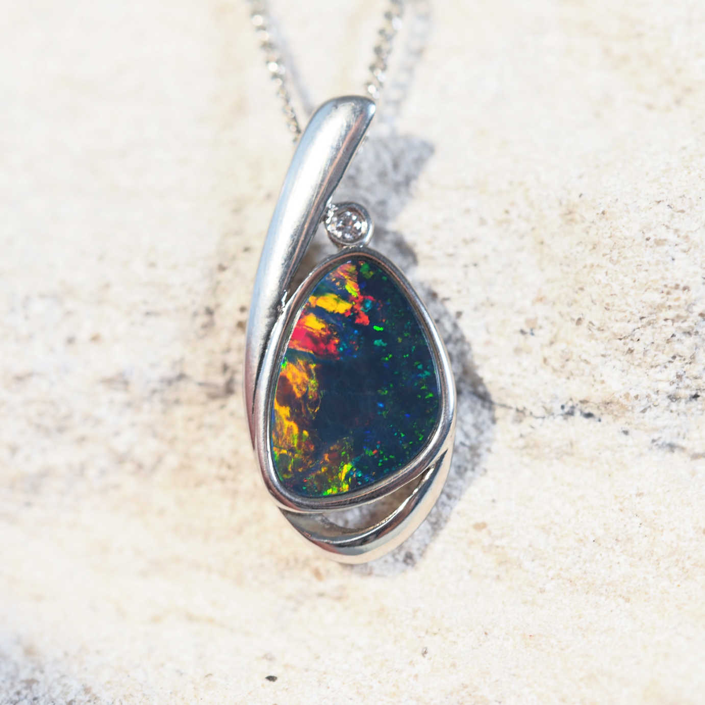 colourful doublet opal pendant in silver