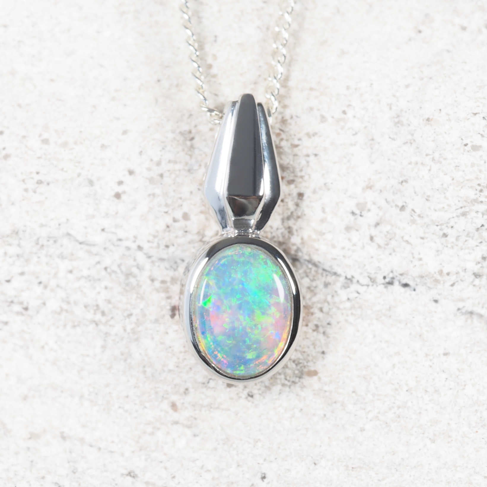 Clara white gold opal pendant with green crystal opal