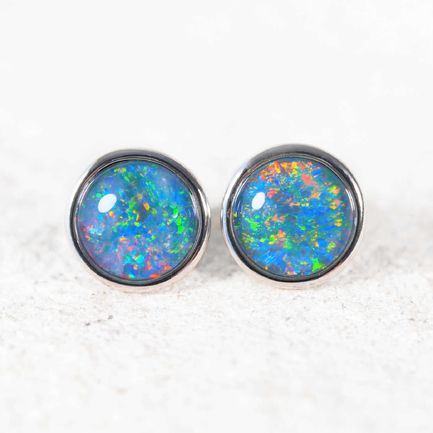 Classic Grande sterling silver stud earrings with round Australian triplet opals