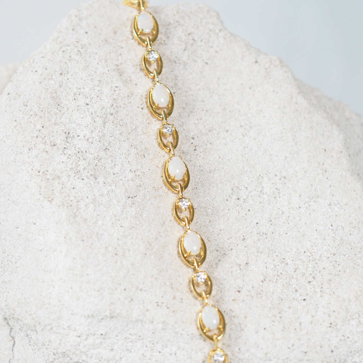 Gold plated opal bracelet with solid white opals