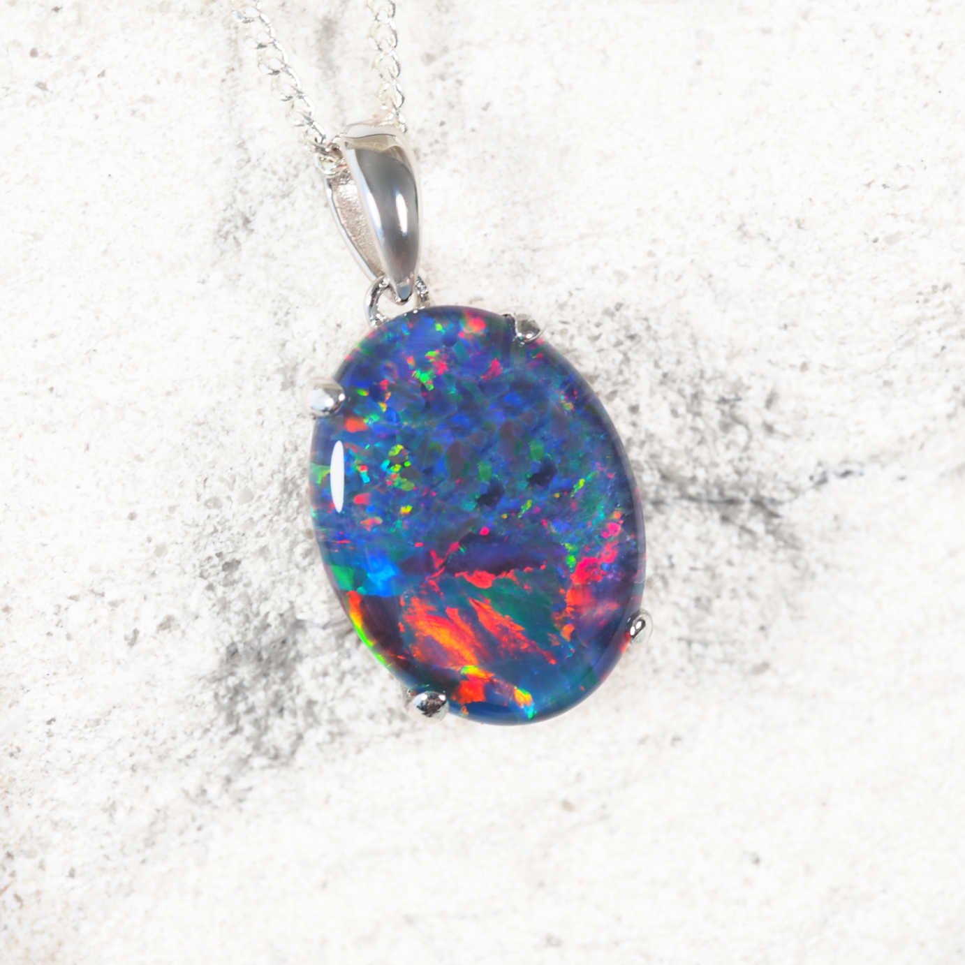 Elegant sterling silver opal necklace pendant featuring oval multi-coloured Australian triplet opal