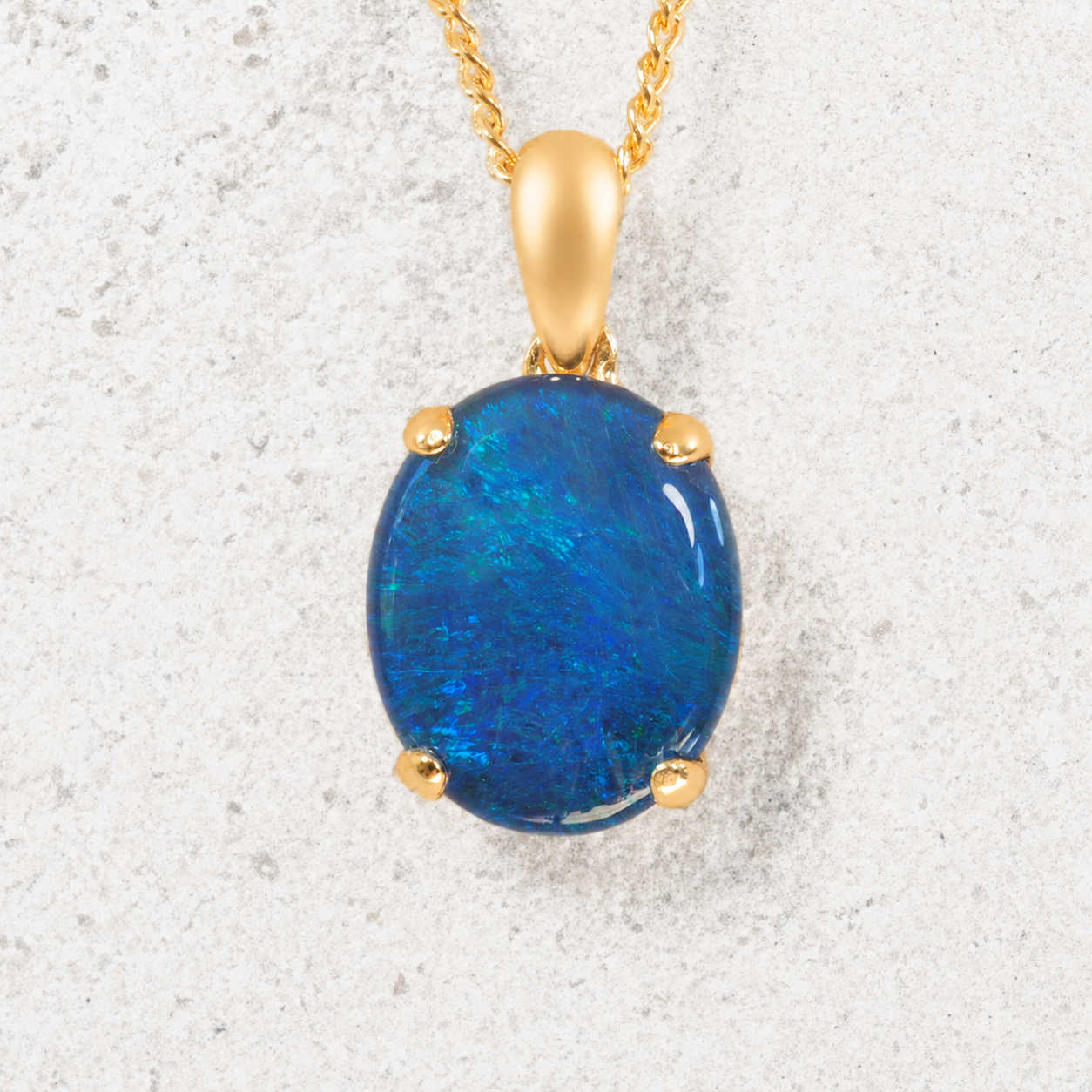 Opal pendant set in gold plated silver