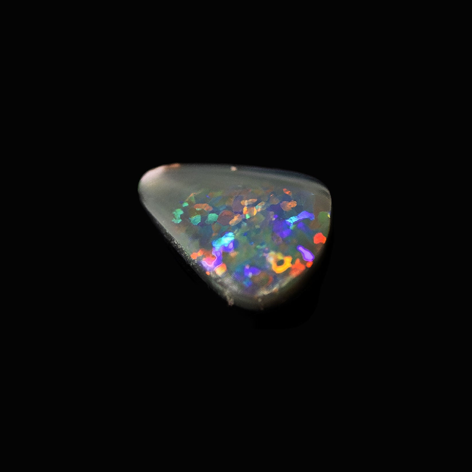 Lightning Ridge opal with vibrant floral pattern and multicolour fire