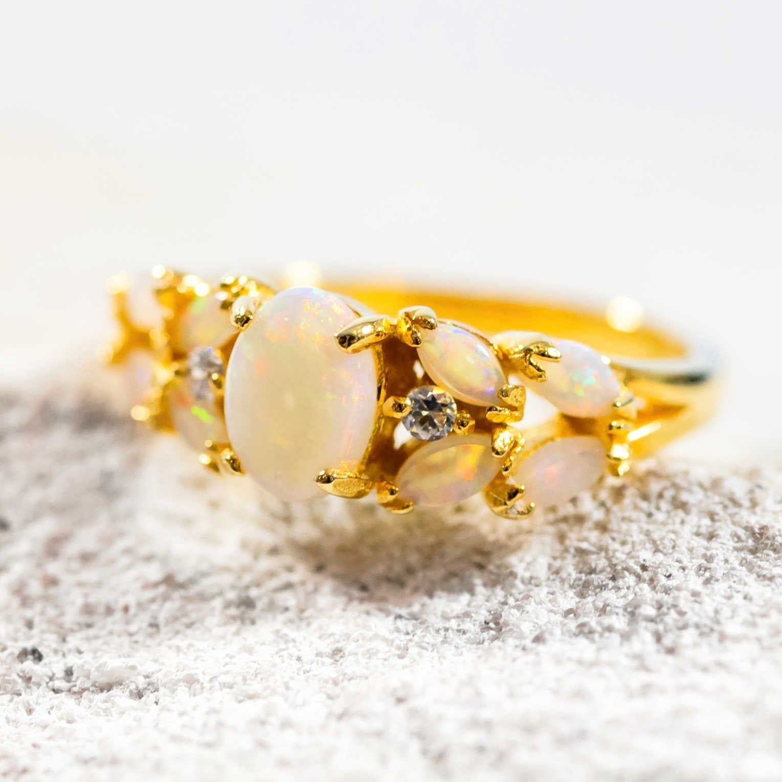 colourful white opal marquise shaped opal ring