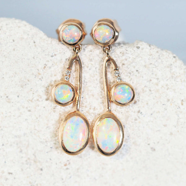 crystal opal earrings set in 18ct gold