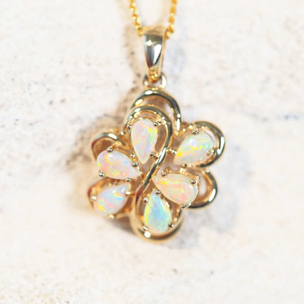 gold opal pendant set with six colourful crystal opals