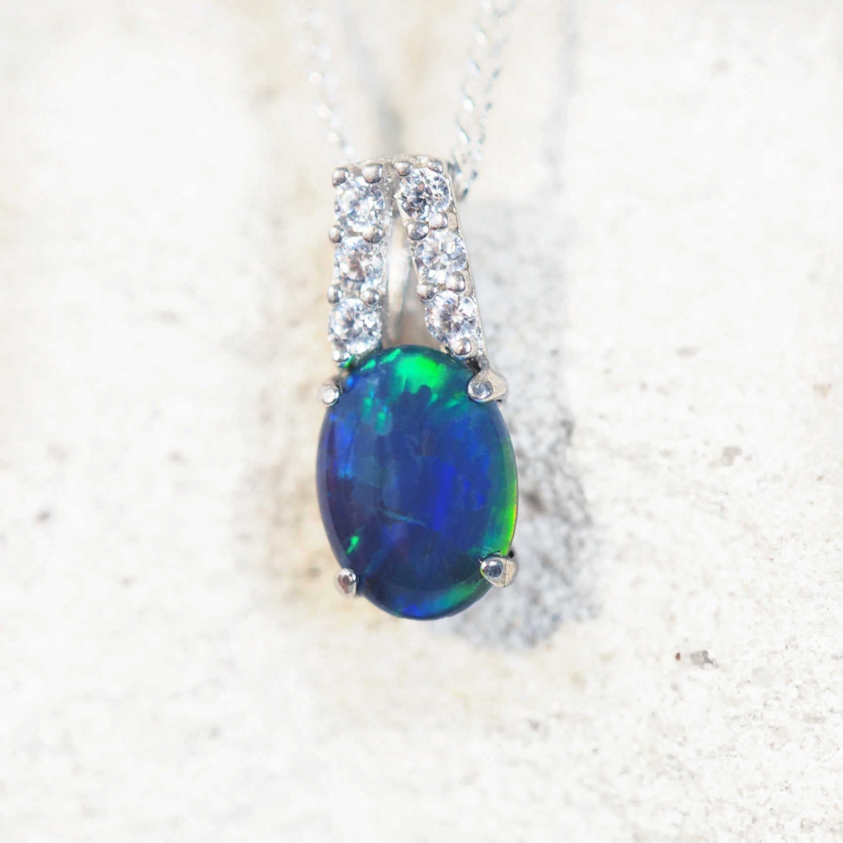 blue and green opal pendant set in sterling silver