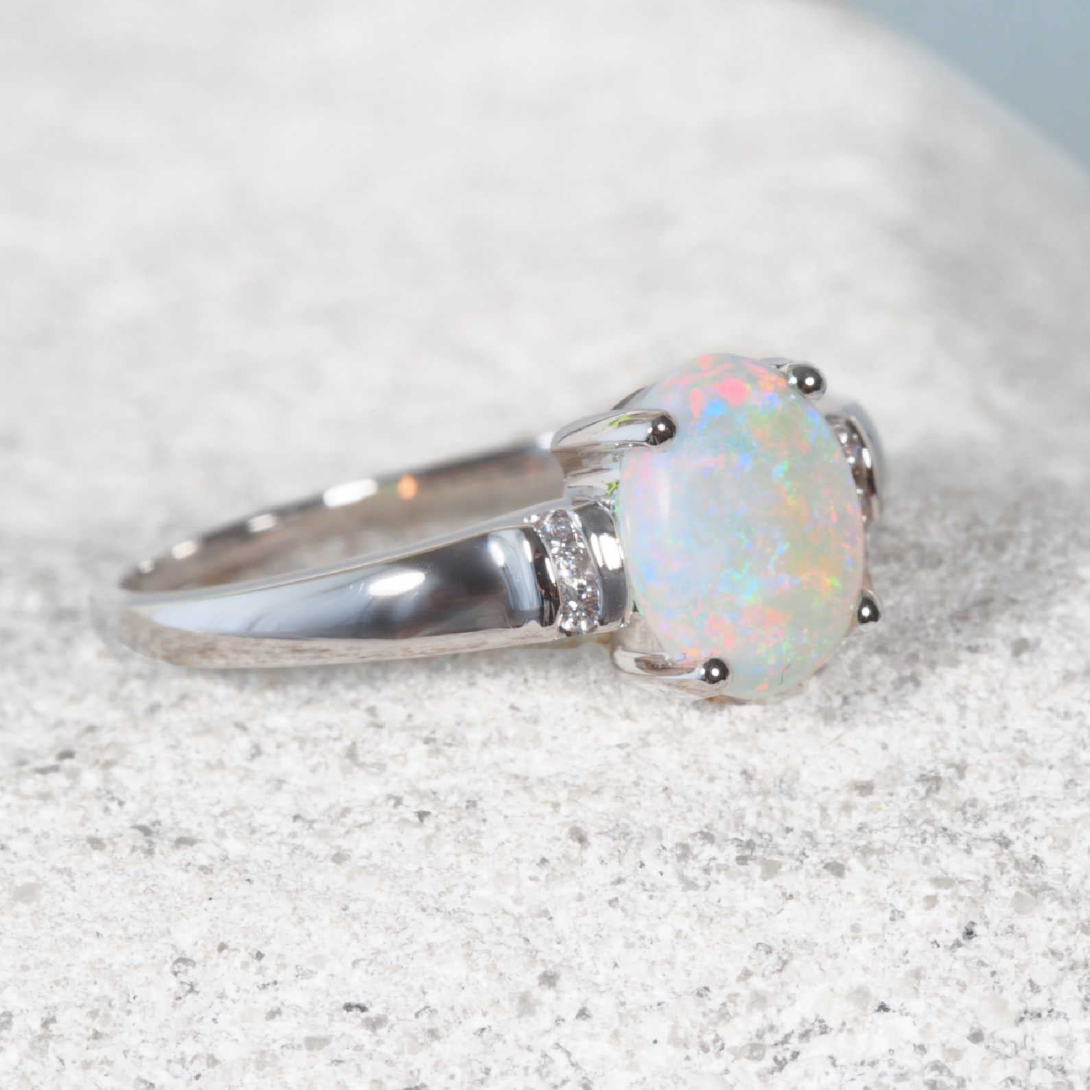 Natural Ausralian opal set in white gold with diamonds