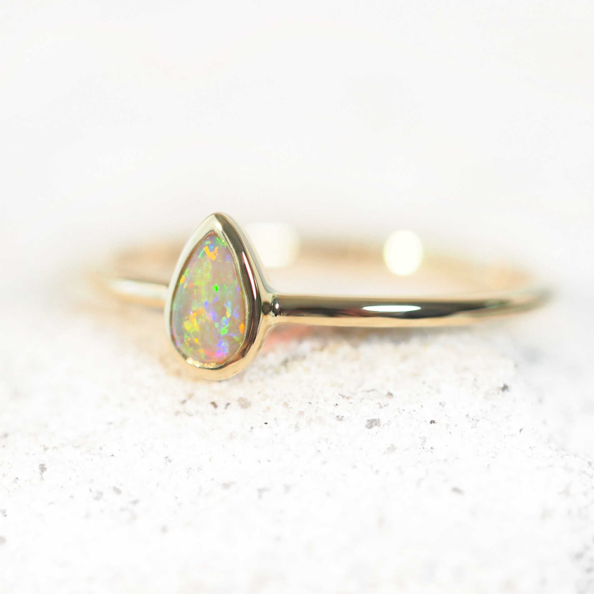 lightning ridge opal ring set in 14ct yellow gold