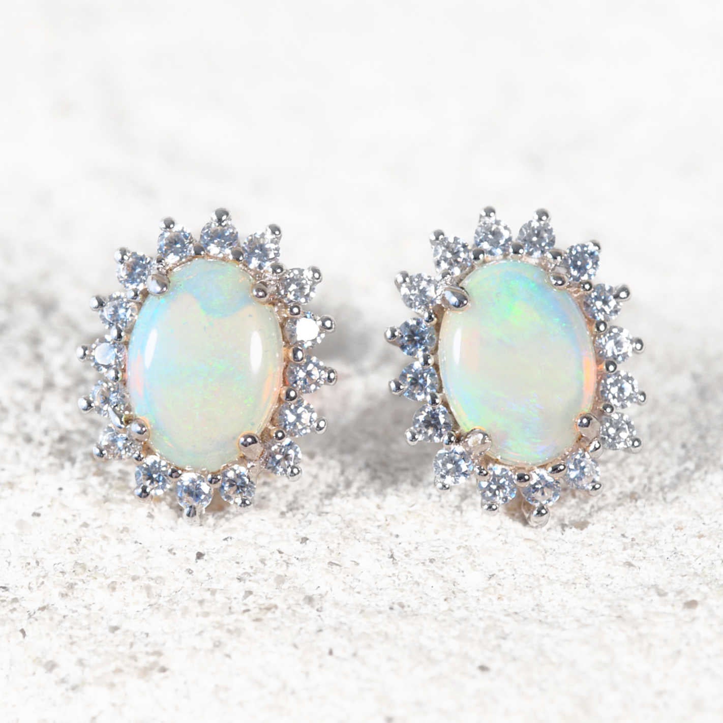 Sterling silver ‘Duchess Green’ stud earrings with oval green crystal opals and cubic zirconia halo